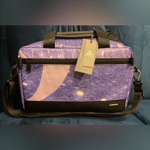 BRAND NEW, NEVER USED.  Rareform convertible laptop bag.